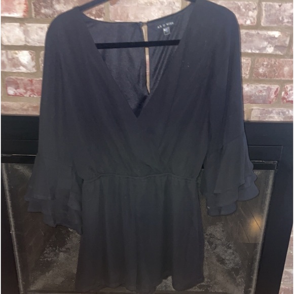 Black romper size medium. Worn once - Picture 1 of 5